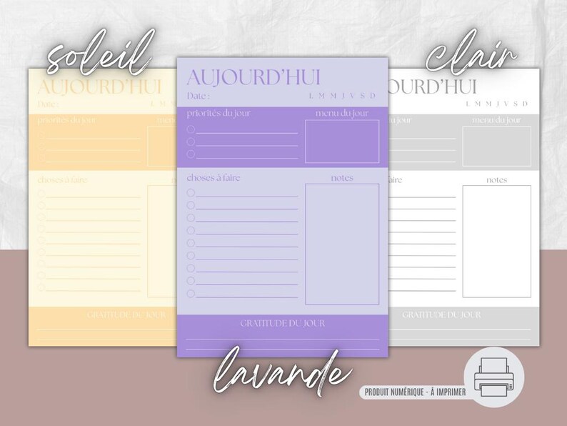 May include: Three printable daily planner sheets in pastel colors: yellow, lavender, and gray. Each sheet features the text "AUJOURD'HUI" and sections for priorities, to-do lists, and notes. The word "lavande" is written in cursive.