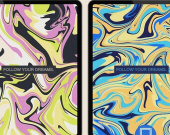 May include: Two iPad screens displaying abstract, colorful designs. One features a mix of pink, yellow, and black swirls, while the other showcases blue, yellow, and orange patterns. Both screens have the text "FOLLOW YOUR DREAMS."