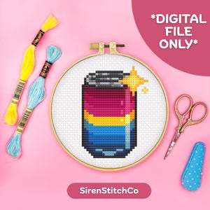 May include: A cross-stitch design of a can in the Pansexual Pride flag colors, displayed in a wooden embroidery hoop. The image includes yellow and blue embroidery floss, gold scissors, and a blue needle minder. Text reads "*DIGITAL FILE ONLY*".