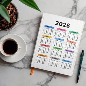 May include: A set of three ceramic mugs with a speckled, matte finish. The mugs are in shades of cream, light gray, and dark gray. Each mug has a simple, minimalist design, perfect for coffee or tea.