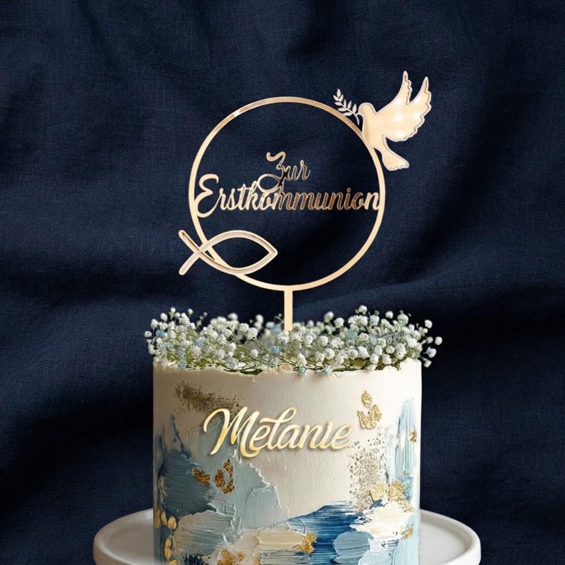 Goldener Tortenstecker zur Erstkommunion aus Acryl mit rundem Rahmen, Taube, christlichem Fischsymbol und Schriftzug – elegante Kommuniondeko für Mädchen und Jungen.