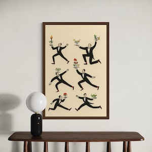 May include: A framed print featuring six stylized illustrations of men in black tuxedos, each balancing items like candles, cocktails, and flowers. The artwork has a vintage aesthetic, with a cream-colored background and a dark brown frame. The print is displayed above a wooden console table.