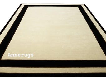 Carpette en laine touffetée à la main - bordure moderne crème et noire, tapis avec cadre