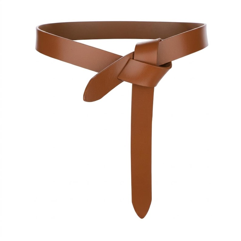 May include: A brown leather belt with a knotted design. The belt is a solid color and has a long, pointed end. The belt is designed to be tied around the waist.