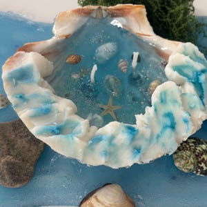 Candela Ocean Memory Shell – Candela artigianale a tema marino con vere conchiglie e stelle marine