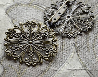 filigree brooch