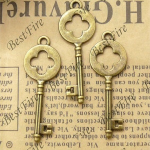 12PCS van 14x40MM bronzen toon charm hanger, metalen bevinding, hanger kralen, sieraden bevindingen, kruissleutel, armband connectoren