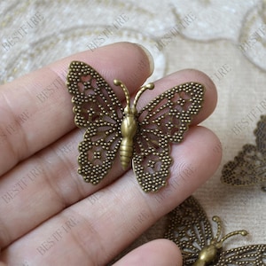 Conectores de filigrana con forma de mariposa en tono bronce, fornituras para joyería (8 unidades)