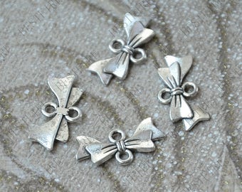 30 stuks van 21 * 10mm zilveren toon Bowknot Connector, sieraden bevindingen, Bowknot charme, Bowknot hanger, twee gaten Charms