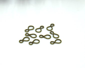 100 pcs of Antique Bronze plated brass Twine 8 connector links,fancy jumpring,metal bead,findings, Horse eye connector links