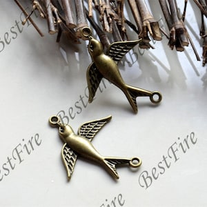 10 pezzi di connettori color bronzo da 29 x 37 mm a forma di uccelli, perline pendenti a forma di uccelli, ciondoli a due fori
