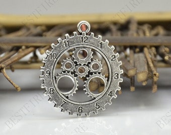 Colgante Steampunk con forma de engranaje de reloj en tono plateado (25 x 27 mm)