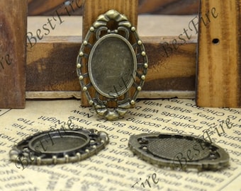May include: Three antique bronze metal picture frames with ornate designs. The frames are oval shaped and have a raised edge around the opening. The frames are perfect for adding a vintage touch to any project.