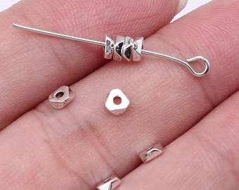 Silverfärgade metalldistanspärlor, armbandskopplingar (4 mm)