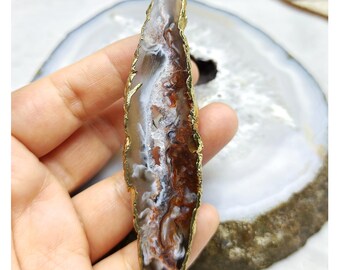 Colgante chapado en oro con geoda de ágata drusa