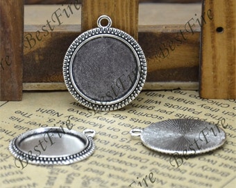 Silverfärgad rund cabochonhängebas (20 mm)