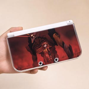 Estuche rígido personalizado para Nintendo New 3DS XL de Evangelion Asuka y la Unidad 02 en color rojo, con un piloto de pie frente a su mecha en luz carmesí.