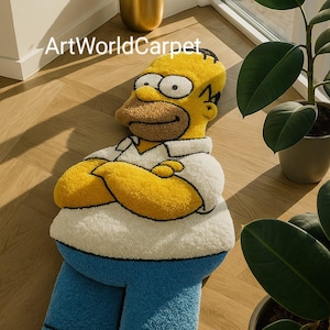 Puede incluir: Una alfombra novedosa con la forma de un personaje de dibujos animados, con piel amarilla, camisa blanca, pantalones azules y zapatos negros. La alfombra tiene un aspecto texturizado y afelpado y el texto "ArtWorldCarpet" es visible.