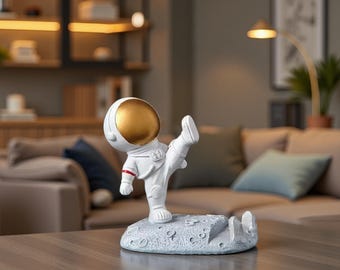 Nordic Astronaut Phone Stand: Resin Spaceman Desk Decor