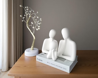 Escultura familiar abstracta: figura de resina minimalista moderna