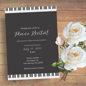 May include: A piano recital invitation with a dark gray background and piano key borders. The invitation includes the text "Please join us for a Piano Recital" and event details. White roses and buds are on a wooden background.