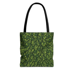 May include: A tote bag with a black handle and a green leaf pattern. The bag's design features a detailed illustration of green leaves and vines, creating a natural and organic aesthetic. The bag is designed for carrying items.