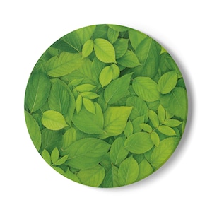 May include: A circular object featuring a dense, overlapping pattern of vibrant green leaves. The design displays various shades of lime, emerald, and forest green, creating a layered botanical texture across the entire round surface area.
