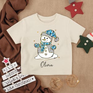 Chemise personnalisée bonhomme de neige pour tout-petits, t-shirt mignon hiver bonhomme de neige pour bébé, tenue personnalisée bonhomme de neige pour les jeunes, cadeau de Noël pour enfants