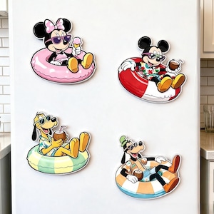 May include: Four decorative refrigerator magnets featuring cartoon characters in summer attire. Minnie Mouse in a pink float with ice cream, Mickey Mouse in a red float with a drink, Pluto in a green float with a coconut, and Goofy in a blue float.