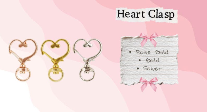 May include: Heart-shaped clasps in rose gold, gold, and silver. The image includes a torn paper note with the words "Heart Clasp" and a list of the clasp colors: Rose Gold, Gold, and Silver.