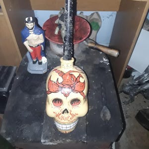 Fiery Skull Ritual with Exu Tranca Rua – Spell for Domination, Curse, and Road Opening