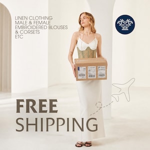A woman in a white dress holding a cardboard box, standing in a room with a white background.