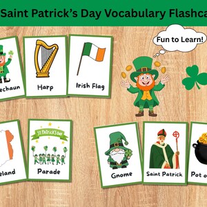 May include: A collection of Saint Patrick's Day vocabulary flashcards. The cards feature illustrations of a leprechaun, harp, Irish flag, gnome, Saint Patrick, and a pot of gold. The text "Fun to Learn!" is also present.