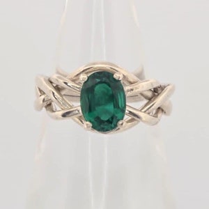 Ladies Gold or Sterling Silver 4 Band Puzzle Ring set with Faceted, Oval Synthetic Emerald