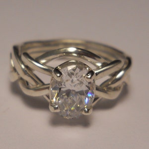 Ladies&#39; 4 Band Puzzle Ring With Cubic Zirconia. Style 4CZ