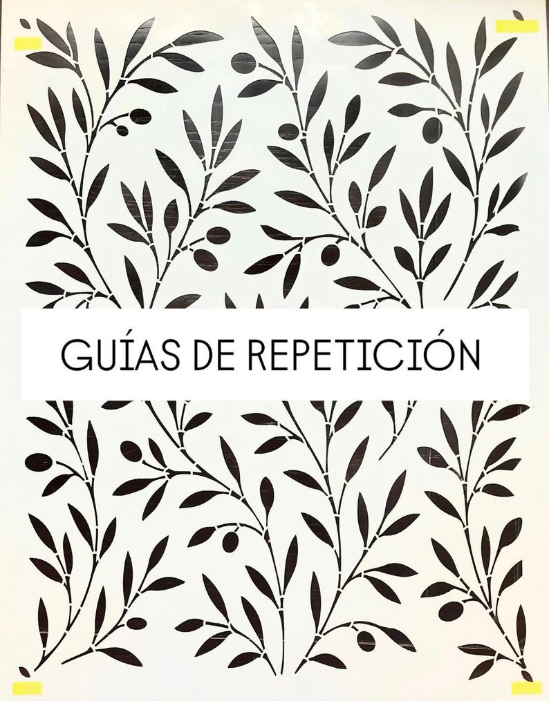 May include: A stencil featuring a repeating pattern of black olive branches and leaves on a white background. The text "GU&Iacute;AS DE REPETICI&Oacute;N" is displayed in a white rectangular box. Yellow tape is on the corners.