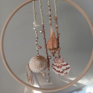 Wind chime with enchanting shells and pearls