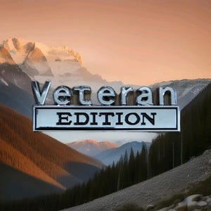 May include: A chrome-colored emblem with the words "Veteran Edition" against a backdrop of a mountain range at sunset. The text is in a bold, sans-serif font, and the background features layers of mountains and trees.