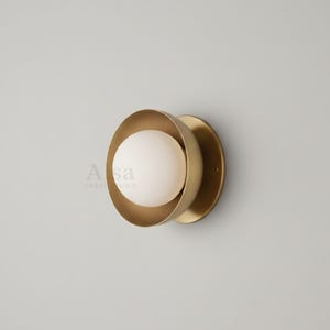 Contemporary gold wall light for living room and hallway decor