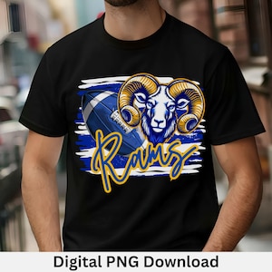 May include: Black t-shirt featuring a graphic of a ram's head with large golden horns, a blue and white football, and the word "Rams" in yellow. The design is set against a blue and white striped background. Digital PNG Download.