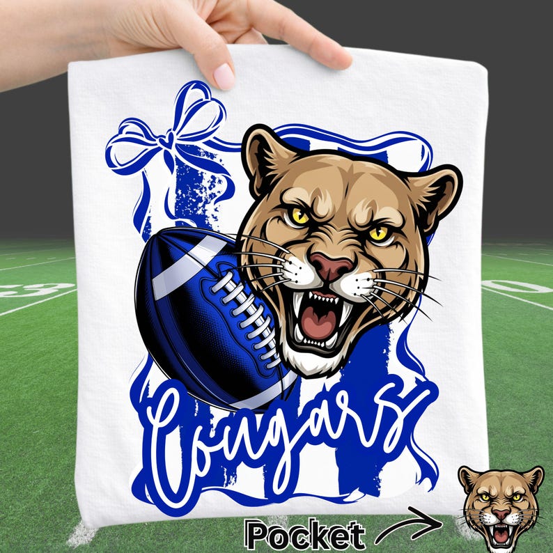 Cougars Football PNG design featuring fierce cougar mascot in bold blue and white team colors with football graphic, including front or back layout and coordinating pocket design. High resolution sports mascot clipart with transparent background for football game day shirts, school spirit apparel, football mom tees, pep rally outfits, and fall team merchandise.