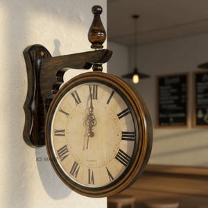 May include: A double-sided, vintage-style wall clock with a dark brown wooden frame and Roman numeral hour markers. The clock face is cream-colored with the word "QUARTZ" printed at the bottom. The clock is mounted on a wall with a decorative wooden bracket.