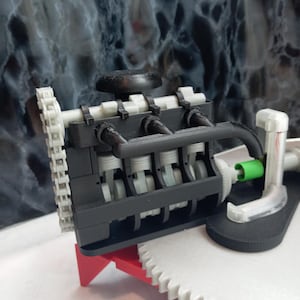 Werkend schaalmodel van een 4-cilindermotor (3D-geprint)