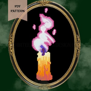 May include: A cross-stitch pattern of a candle with a pink and white flame, set against a black background within a gold oval frame. The candle is yellow and orange. The text "PDF PATTERN" is in the upper left corner.