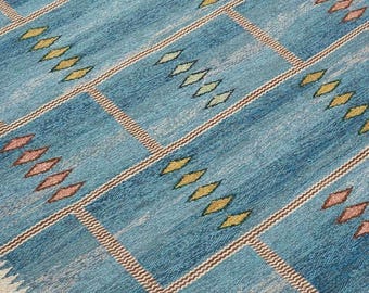 blue and multicolor Vintage weave rug by Anna-Greta Sjöqvist American kilim rug