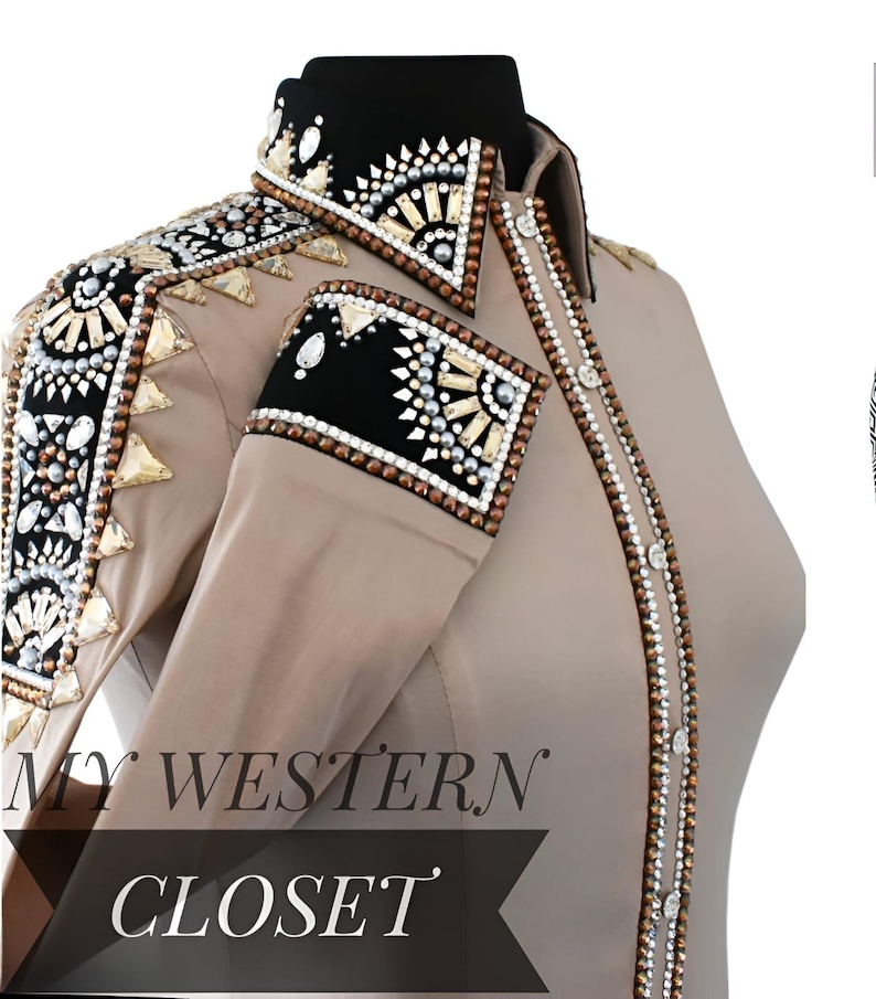 May include: Tan western shirt with elaborate embellishments. The shirt features a black collar and cuffs, adorned with sparkling crystals and decorative elements. The front of the shirt is embellished with a line of small, round, white buttons. The text "MY WESTERN CLOSET" is visible.