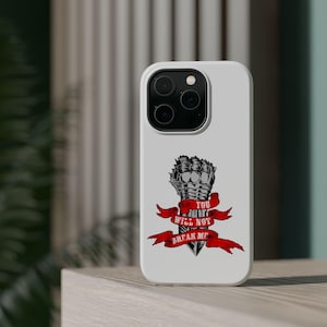 May include: White phone case with a black and red graphic. The graphic features a clenched fist design with a red banner that reads "YOU WILL NOT BREAK ME". The phone case has a camera cutout.