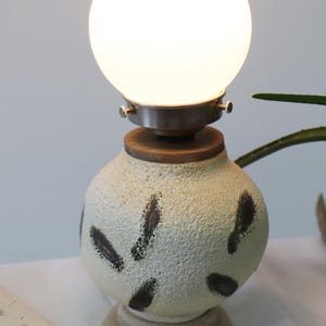 Globe Lamp with Textured Glaze and Metallic Highlights