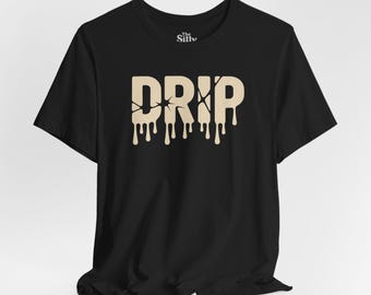 Camiseta con estampado de goteo, diseño de letras derretidas, estilo urbano.