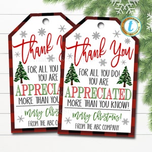 May include: Two red and black buffalo check gift tags with white snowflakes and green Christmas trees. The text on the tags reads "Thank You For All You Do! You Are Appreciated More Than You Know! Merry Christmas! From The ABC Company."